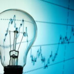 Lightbulb with a graph background