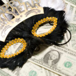 Mardi gras mask on money